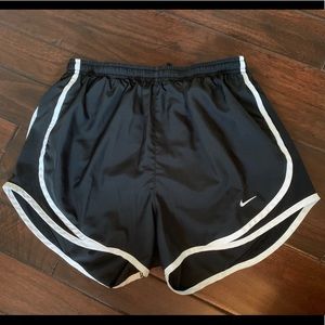 black Nike running shorts
